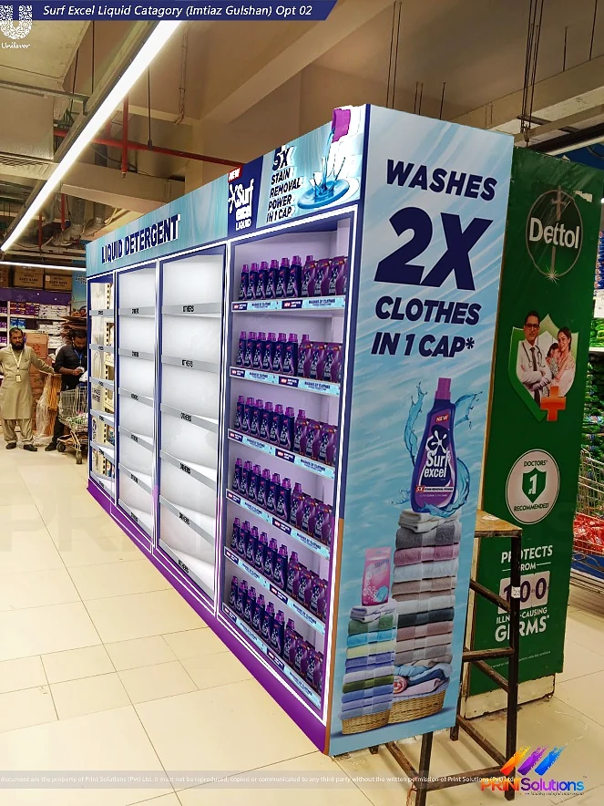 Illuminated Surf Excel liquid detergent bay with the washes-2x claim at eye level