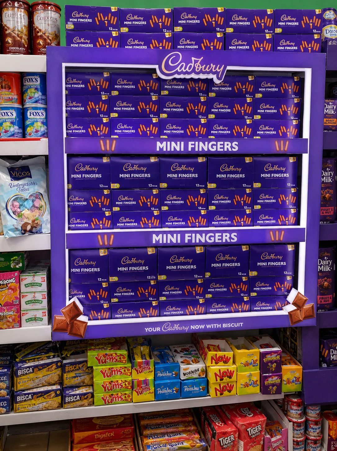 Purple Cadbury illuminated retail category wall